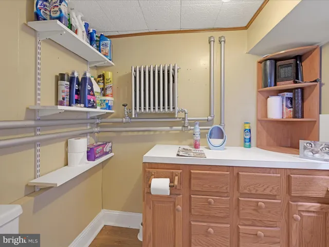 a bedroom with a large bed and a large window