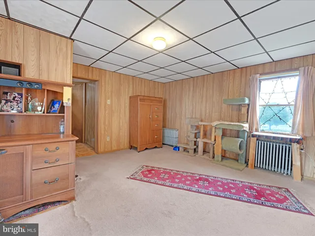 a bedroom with a bed and a cabinets