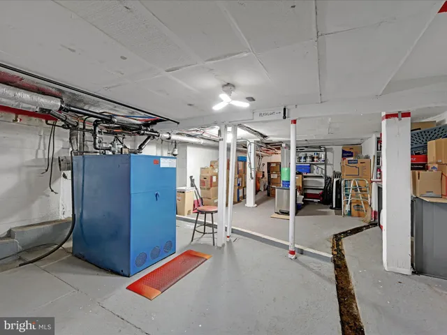 a view of a house with a backyard and a patio