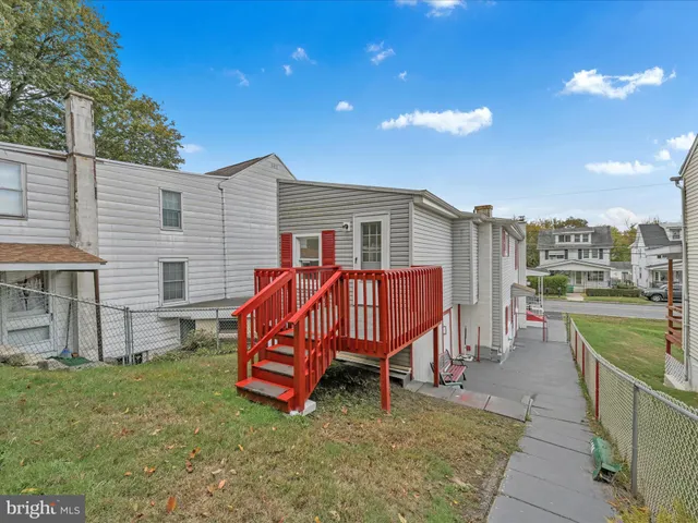 a view of a park with large trees