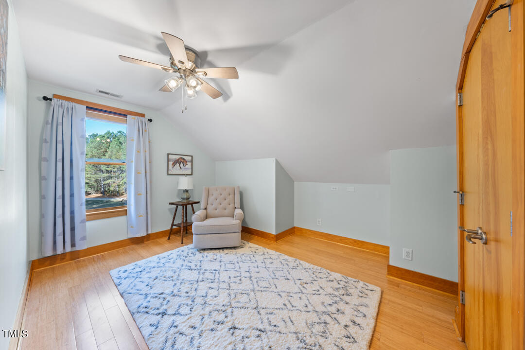 10714 Wilkins Road Rougemont, NC 27572 - Photo 18 of 40 a bedroom with a bed and a window
