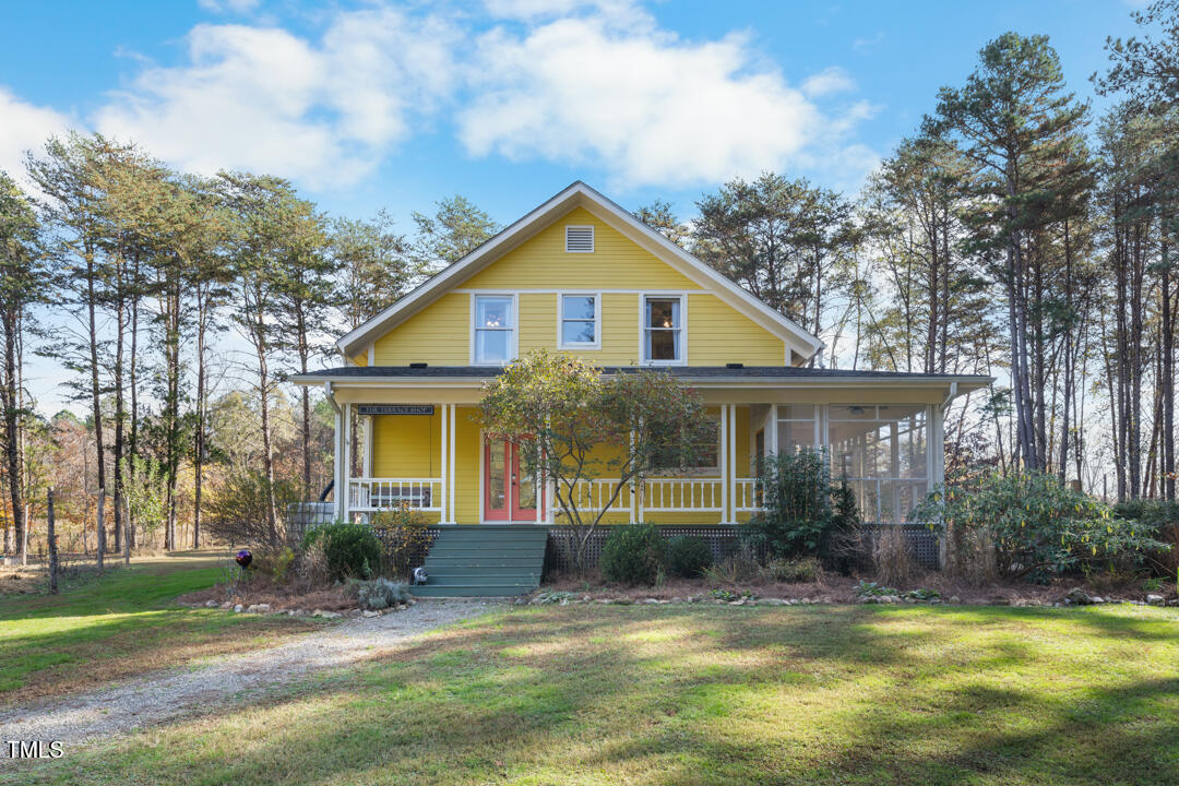 10714 Wilkins Road Rougemont, NC 27572 - Photo 26 of 40 a view of a house with yard and plants