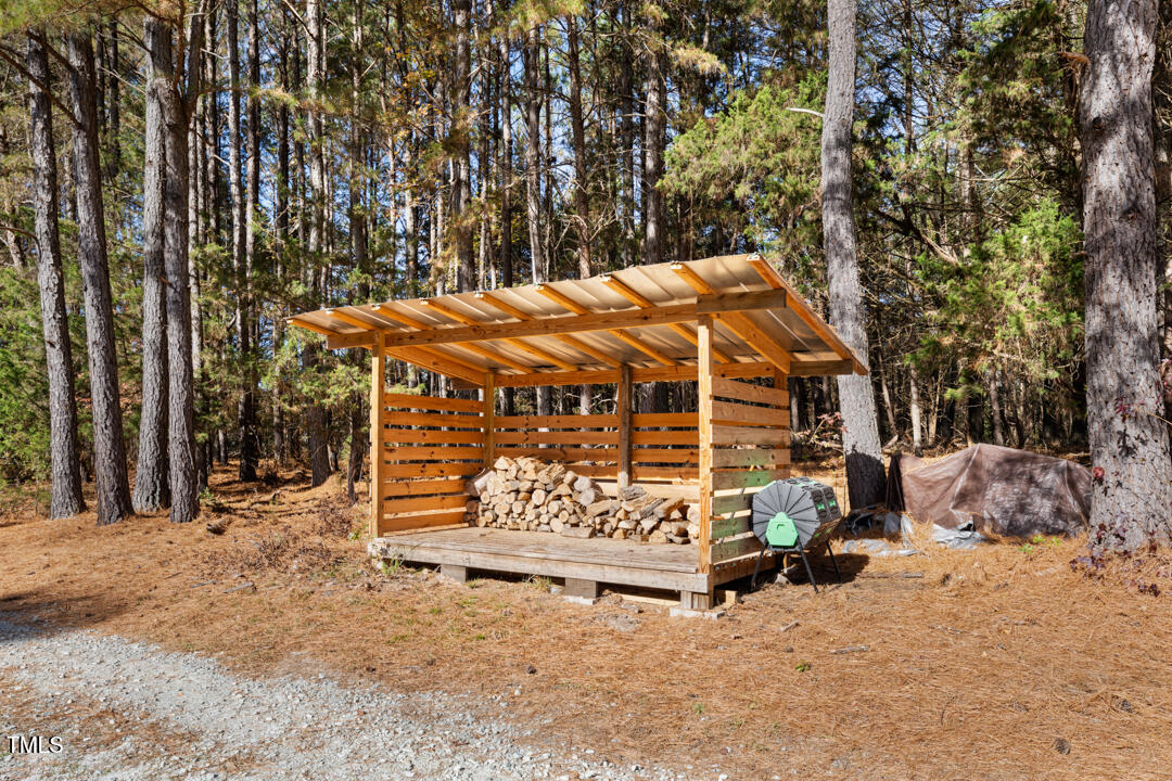10714 Wilkins Road Rougemont, NC 27572 - Photo 31 of 40 front view of a house with a yard