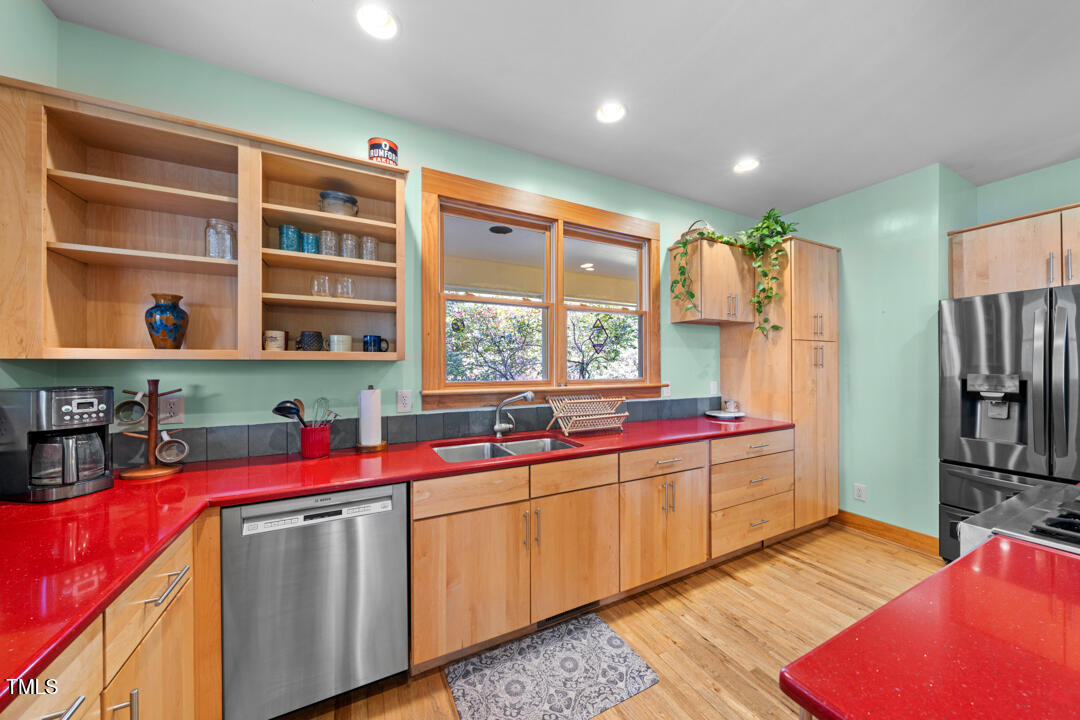 10714 Wilkins Road Rougemont, NC 27572 - Photo 4 of 40 a kitchen with a sink stove and window