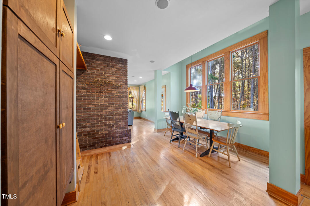 10714 Wilkins Road Rougemont, NC 27572 - Photo 8 of 40 a view of a livingroom with furniture window and wooden floor
