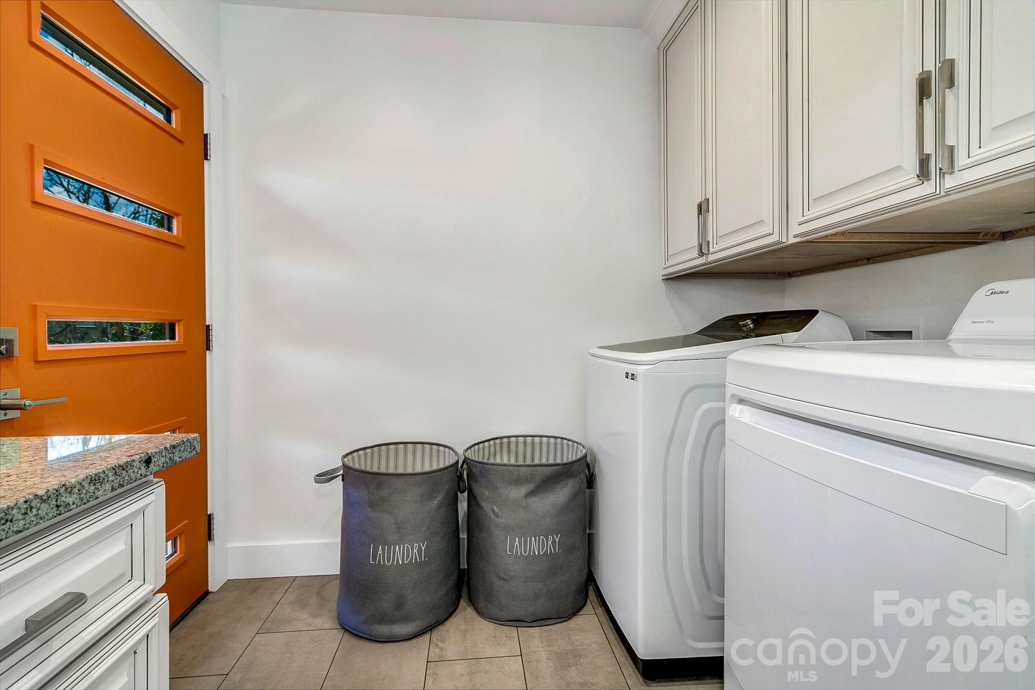 215 East Oakview Road Asheville, NC 28806 - Photo 13 of 42 a utility room with dryer and washer