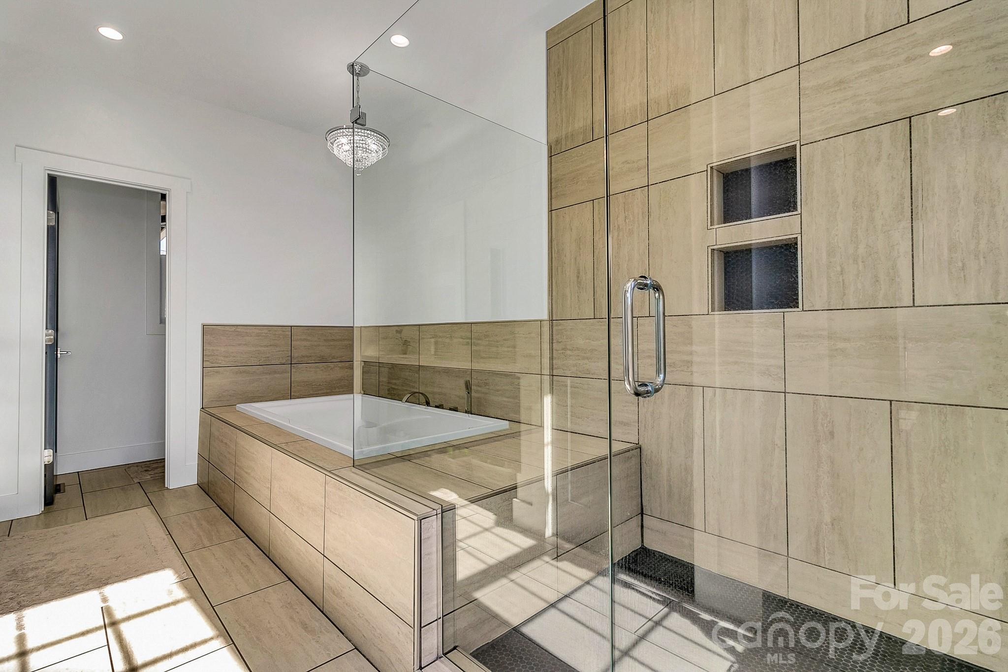 215 East Oakview Road Asheville, NC 28806 - Photo 23 of 42 a bathroom with a tub and a sink