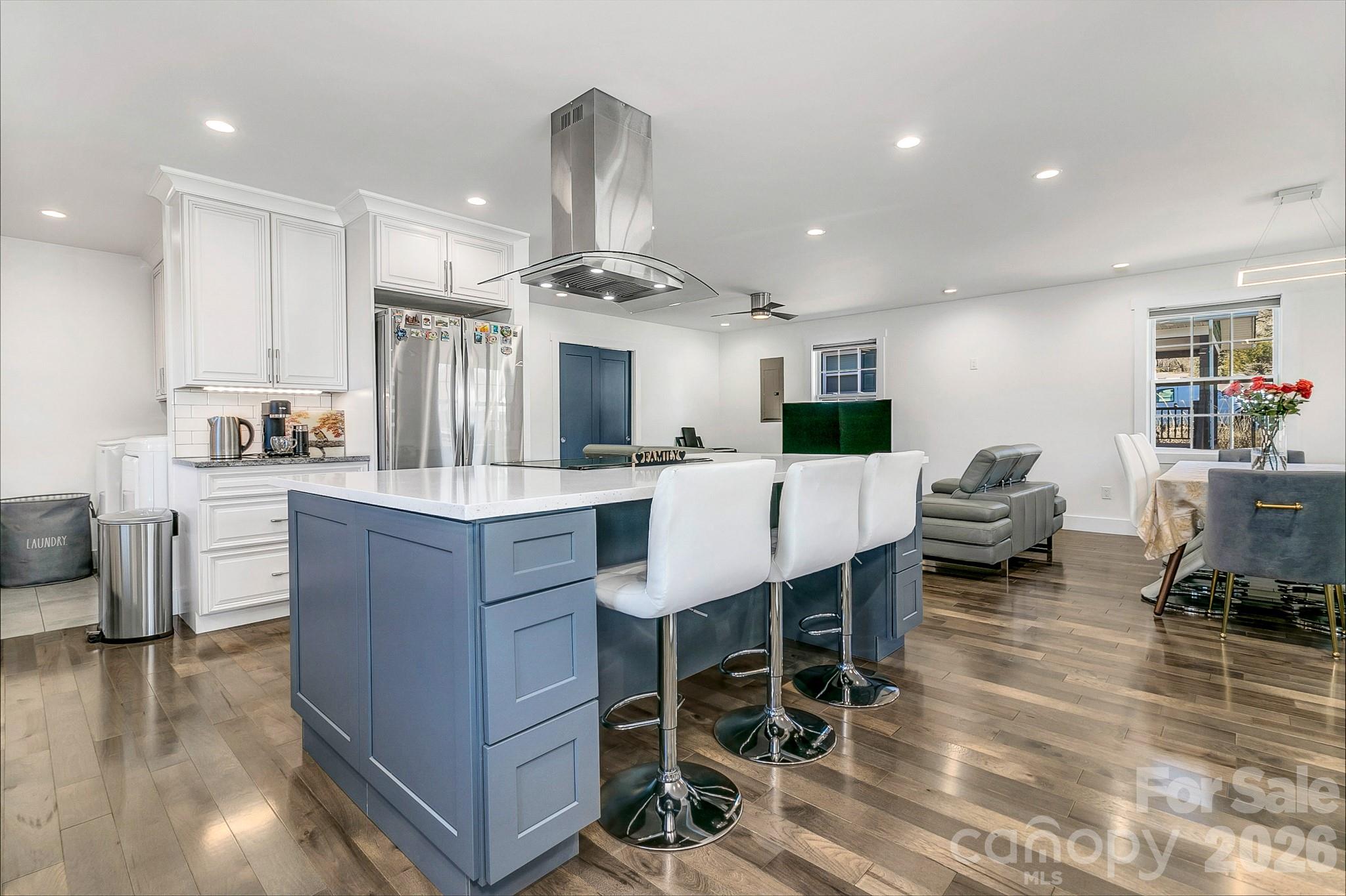 215 East Oakview Road Asheville, NC 28806 - Photo 10 of 42 a large kitchen with a table and chairs
