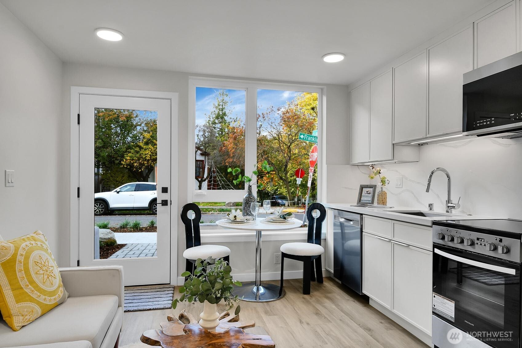 2372 Franklin Avenue East Seattle, WA 98102 - Photo 18 of 32 a living room with furniture fireplace and flat screen tv