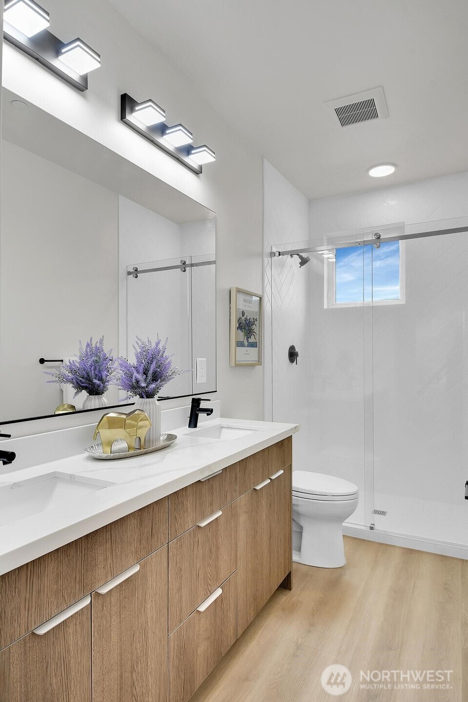 2372 Franklin Avenue East Seattle, WA 98102 - Photo 10 of 32 a bathroom with a sink toilet and shower