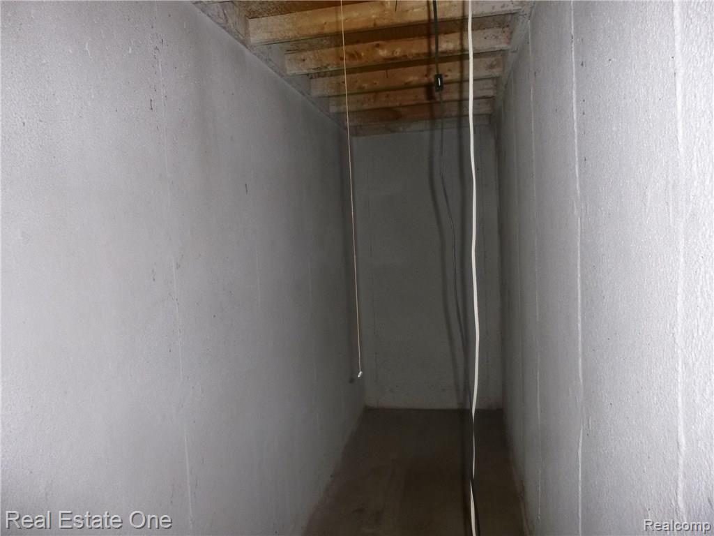 4345 Old Mill Road Pinckney, MI 48169 - Photo 38 of 39 Under porch basement storage area