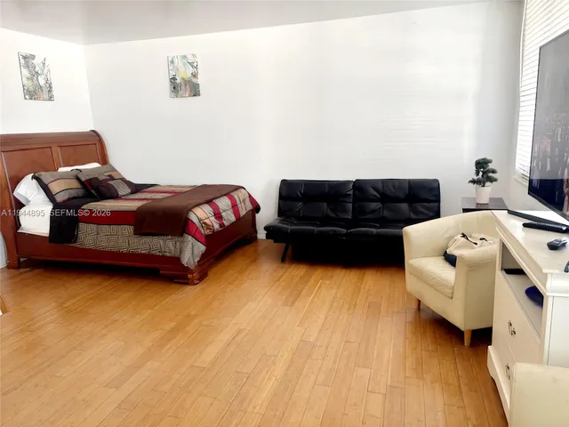 a living room with furniture and a couch