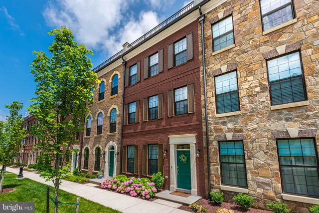a front view of a multi story residential apartment building