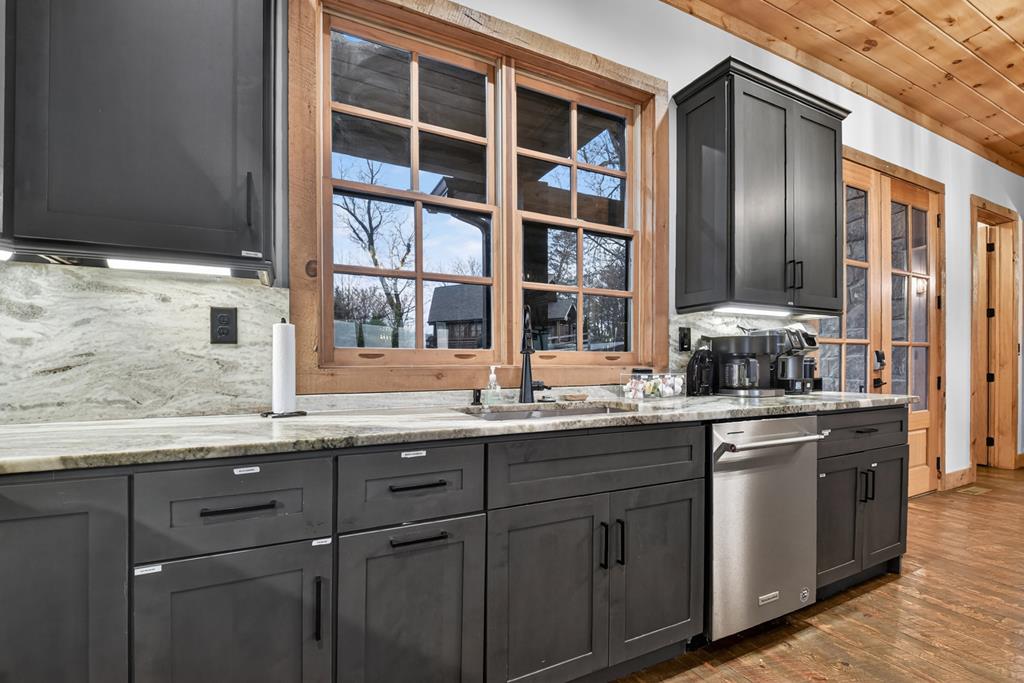 472 Overlook Drive Blue Ridge, GA 30513 - Photo 12 of 58 a kitchen with stainless steel appliances granite countertop cabinets and window