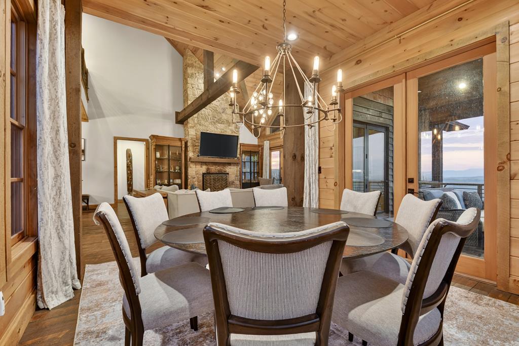 472 Overlook Drive Blue Ridge, GA 30513 - Photo 15 of 58 a dining room with furniture a livingroom and chandelier