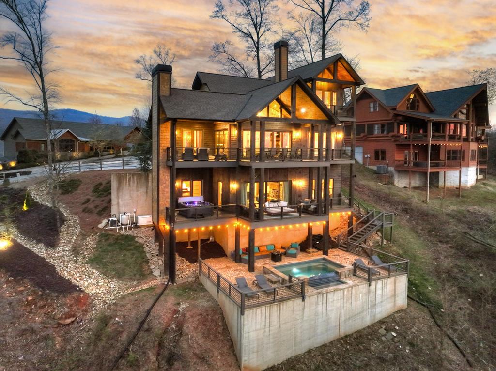 472 Overlook Drive Blue Ridge, GA 30513 - Photo 24 of 58 a view of a house with backyard and sitting area