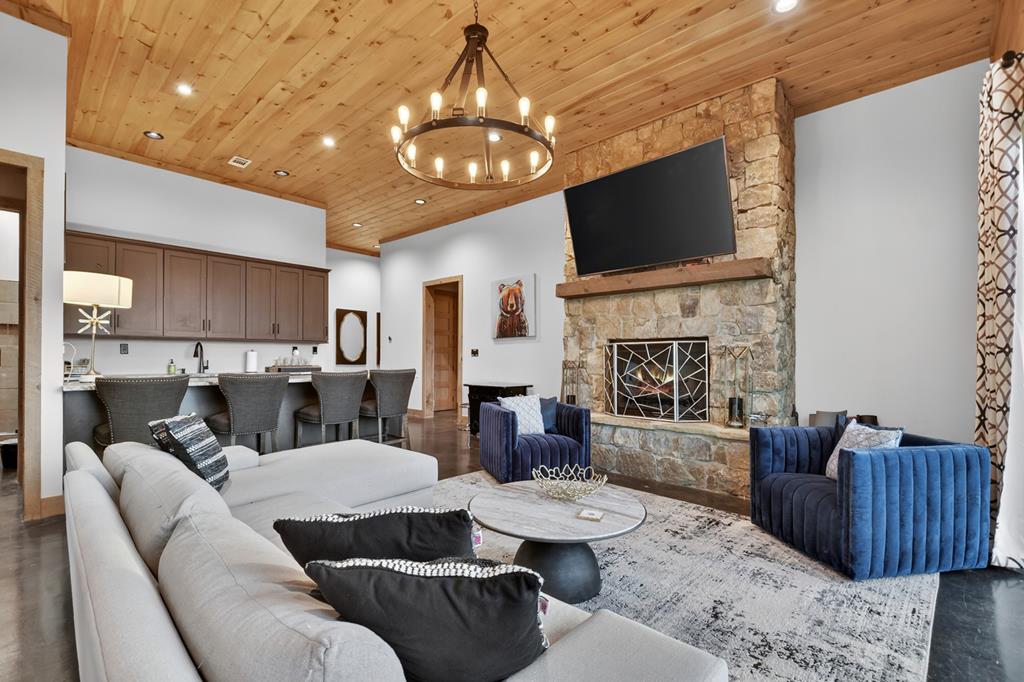 472 Overlook Drive Blue Ridge, GA 30513 - Photo 36 of 58 a living room with fireplace furniture and a flat screen tv