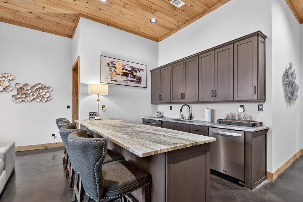 472 Overlook Drive Blue Ridge, GA 30513 - Photo 38 of 58 a view of a kitchen area with furniture and wooden floor