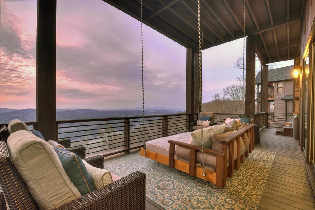 472 Overlook Drive Blue Ridge, GA 30513 - Photo 51 of 58 a balcony with furniture and a table