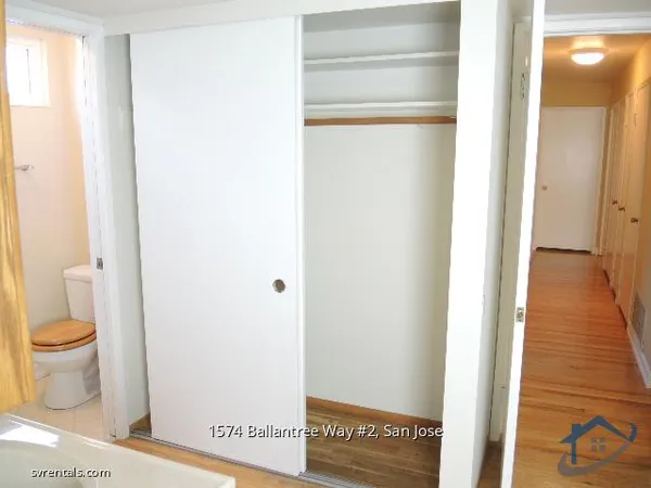 a view of a bathroom with a toilet
