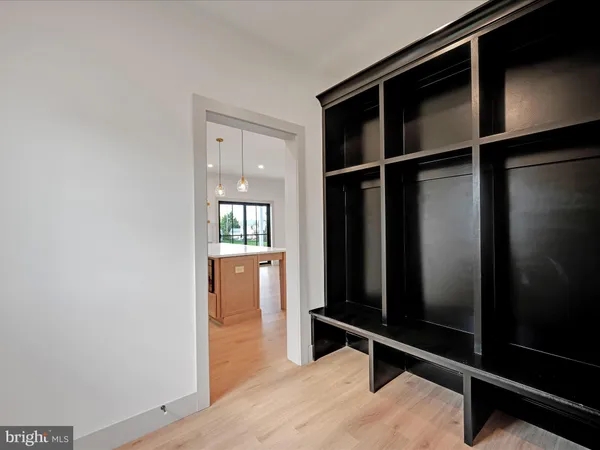a hallway with wooden floor