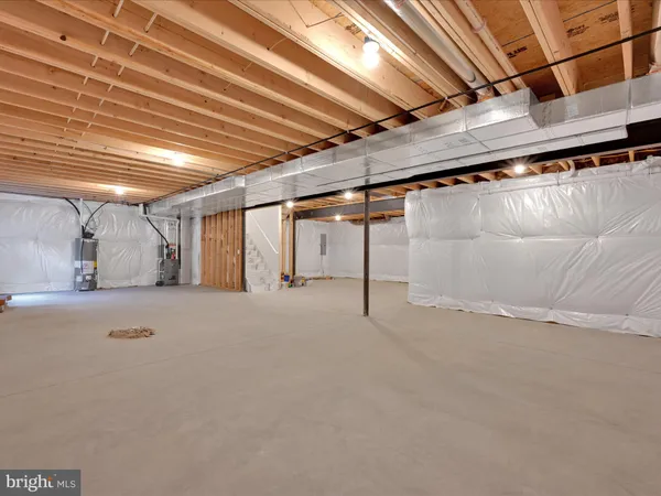 a view of a room with wooden walls