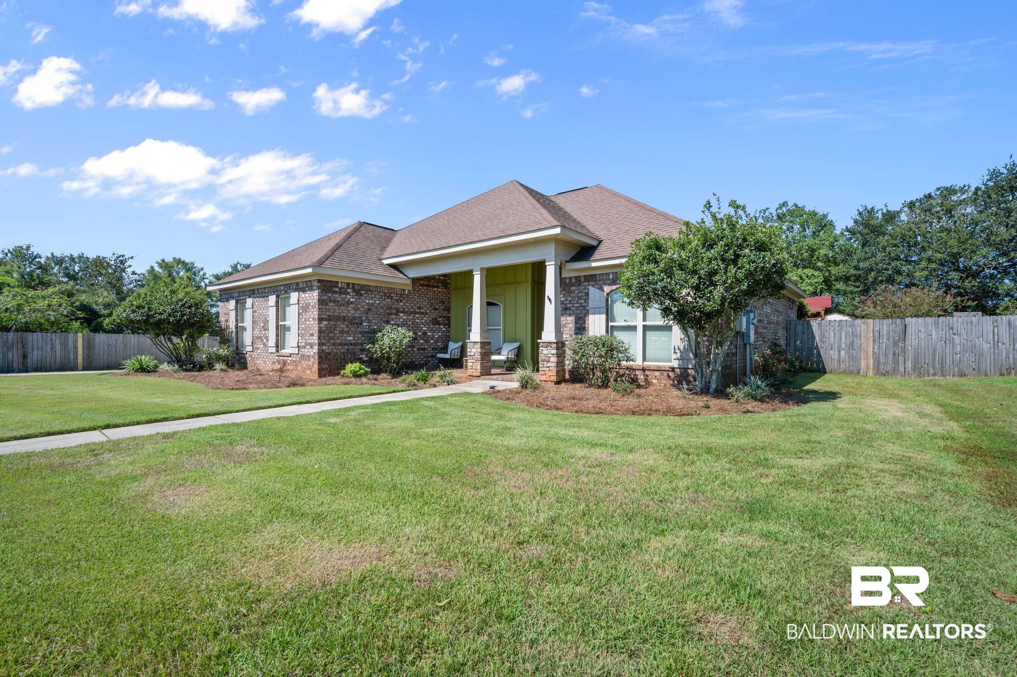 3879 Symphony Way West Semmes, AL 36575 - Photo 2 of 34 View of front of house featuring a front yard