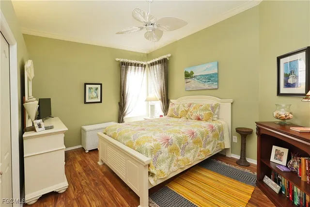 a bedroom with a bed and a table