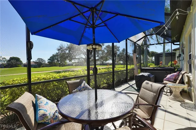 a view of a patio with swimming pool
