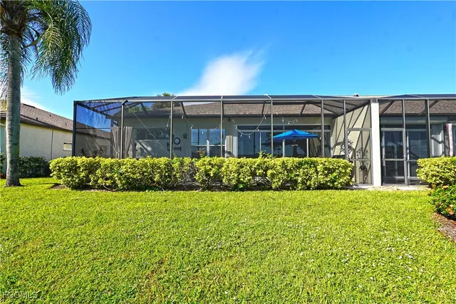 front view of a house with a big yard
