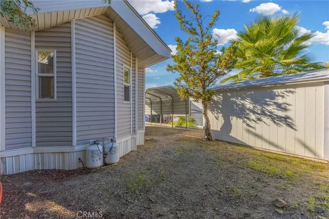 a view of a yard with an trees