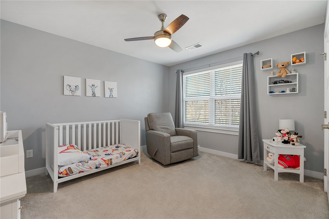 115 Bronson Ridge Anderson, SC 29621 - Photo 33 of 40 Plush carpeting and a large window create a serene environment in this comfortable bedroom.