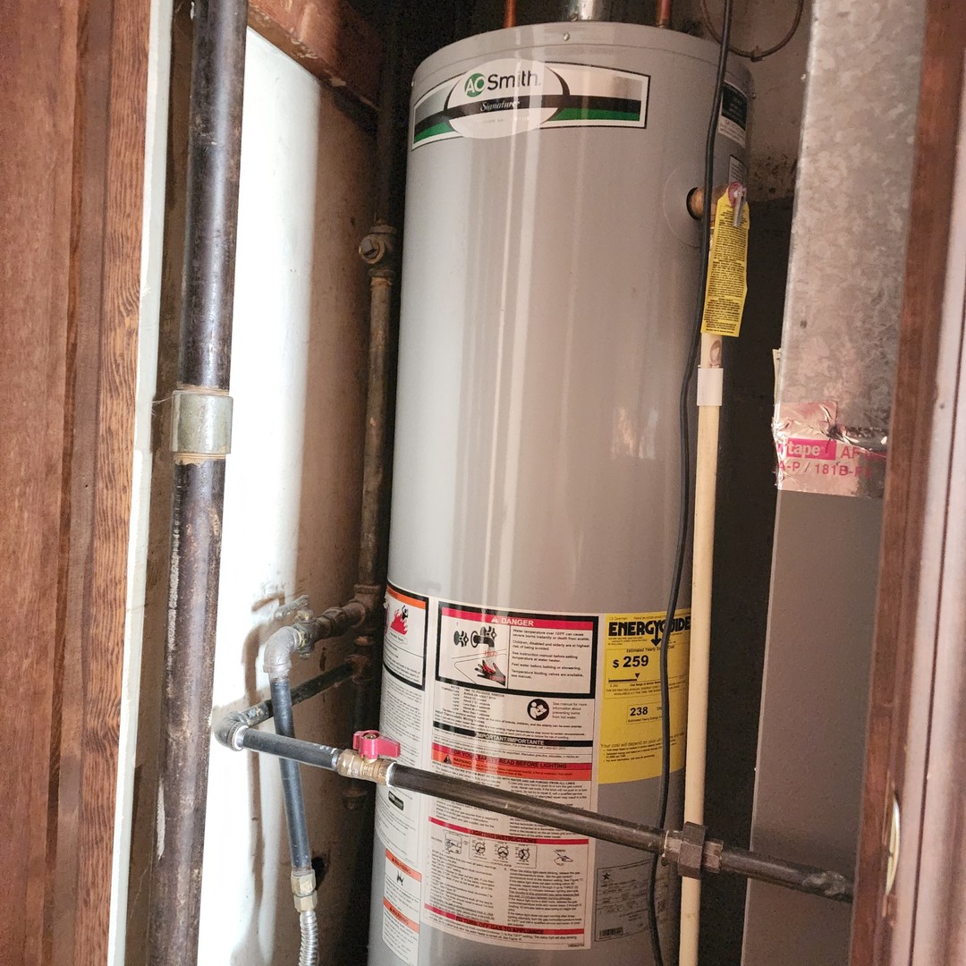 4605 West 84th Place Chicago, IL 60652 - Photo 22 of 31 a close view of water heater room
