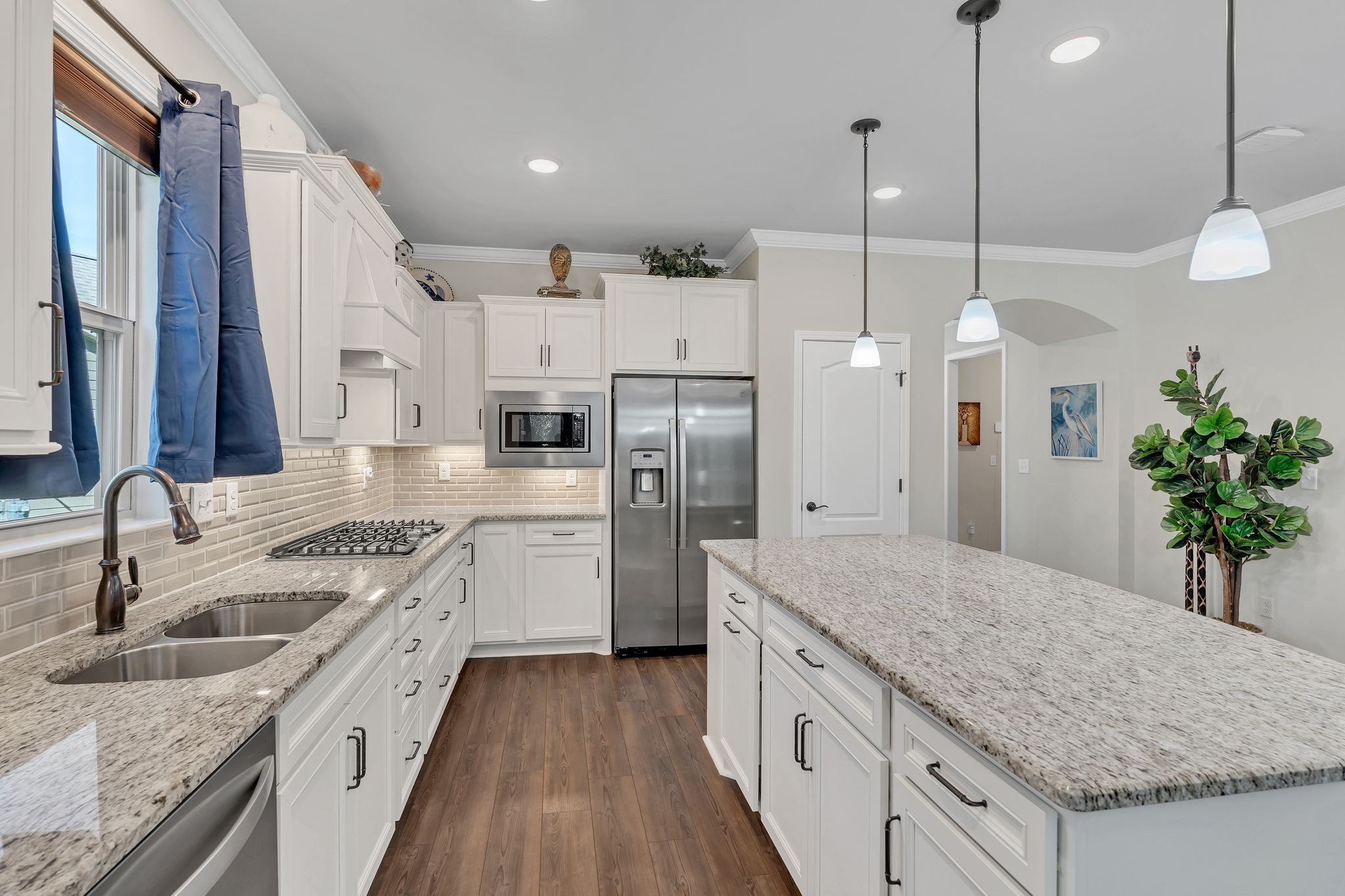 2061 Hardin Place Spring Hill, TN 37174 - Photo 12 of 65 a kitchen with a sink stove and refrigerator