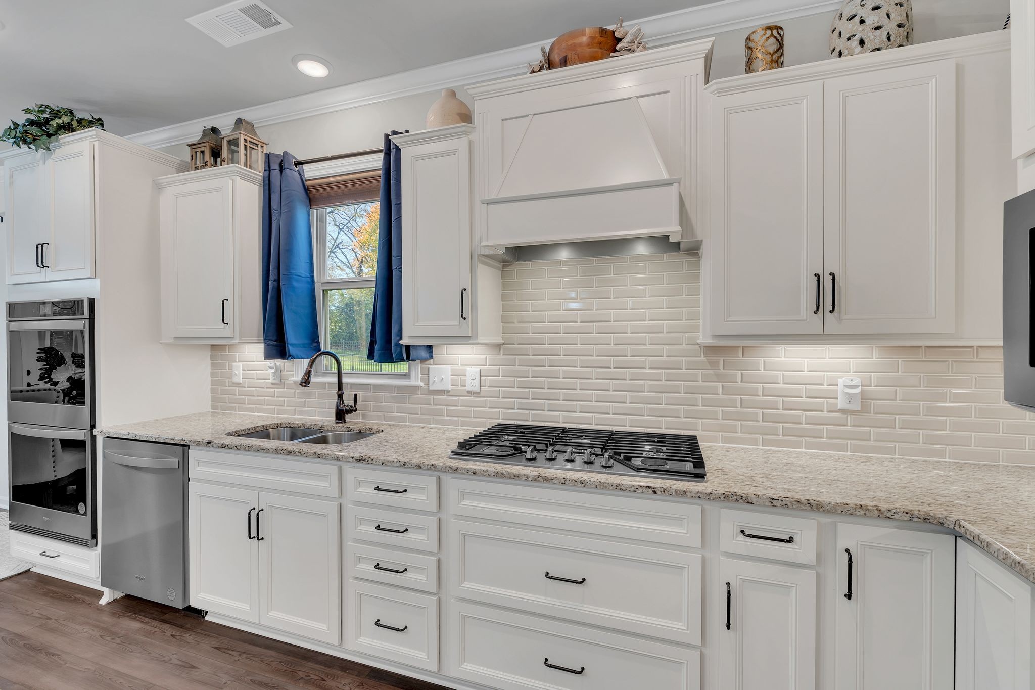 2061 Hardin Place Spring Hill, TN 37174 - Photo 13 of 65 a kitchen with stainless steel appliances granite countertop a sink a stove and cabinets