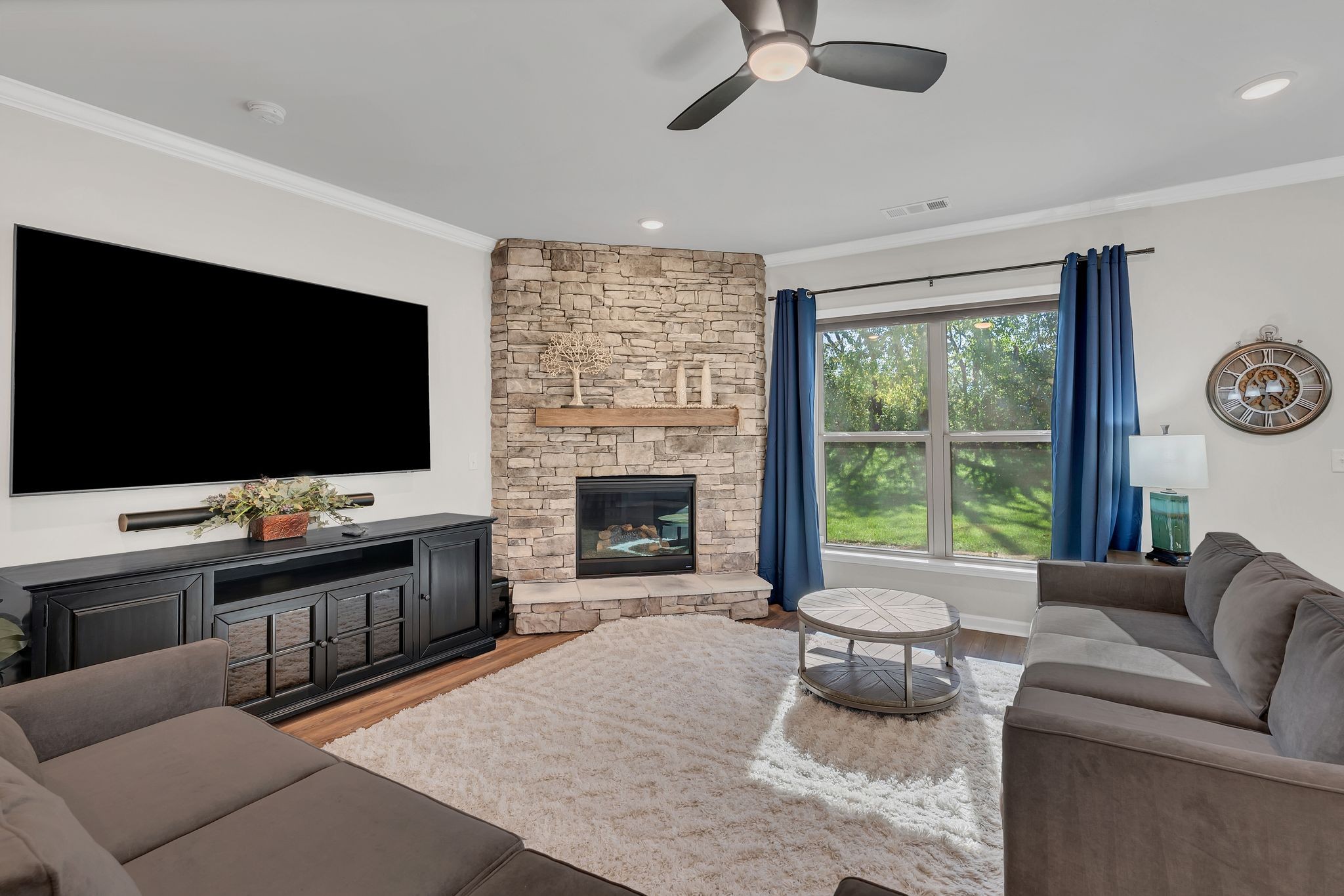2061 Hardin Place Spring Hill, TN 37174 - Photo 14 of 65 a living room with furniture and a flat screen tv