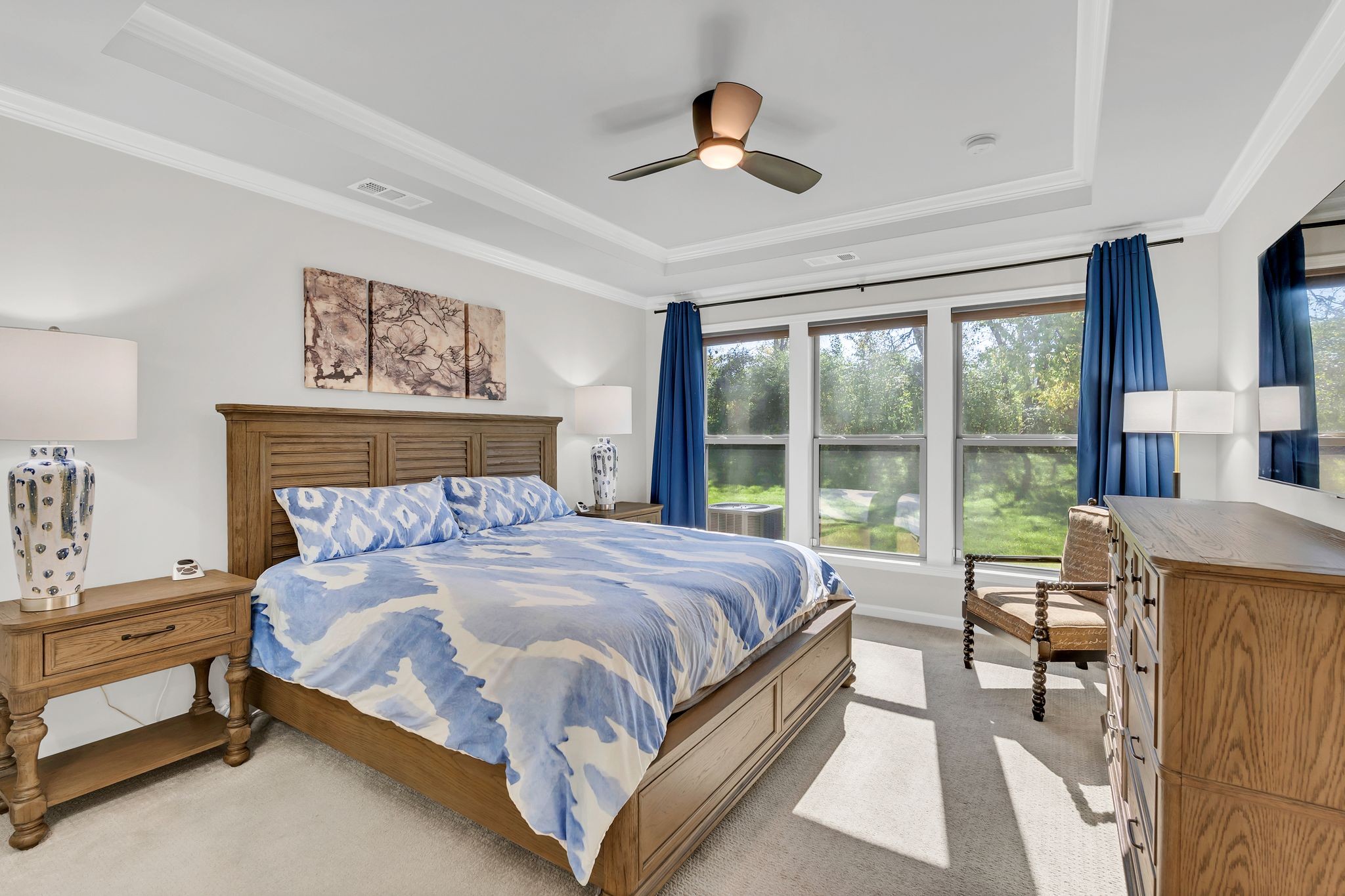 2061 Hardin Place Spring Hill, TN 37174 - Photo 19 of 65 a bedroom with a large bed and a large window