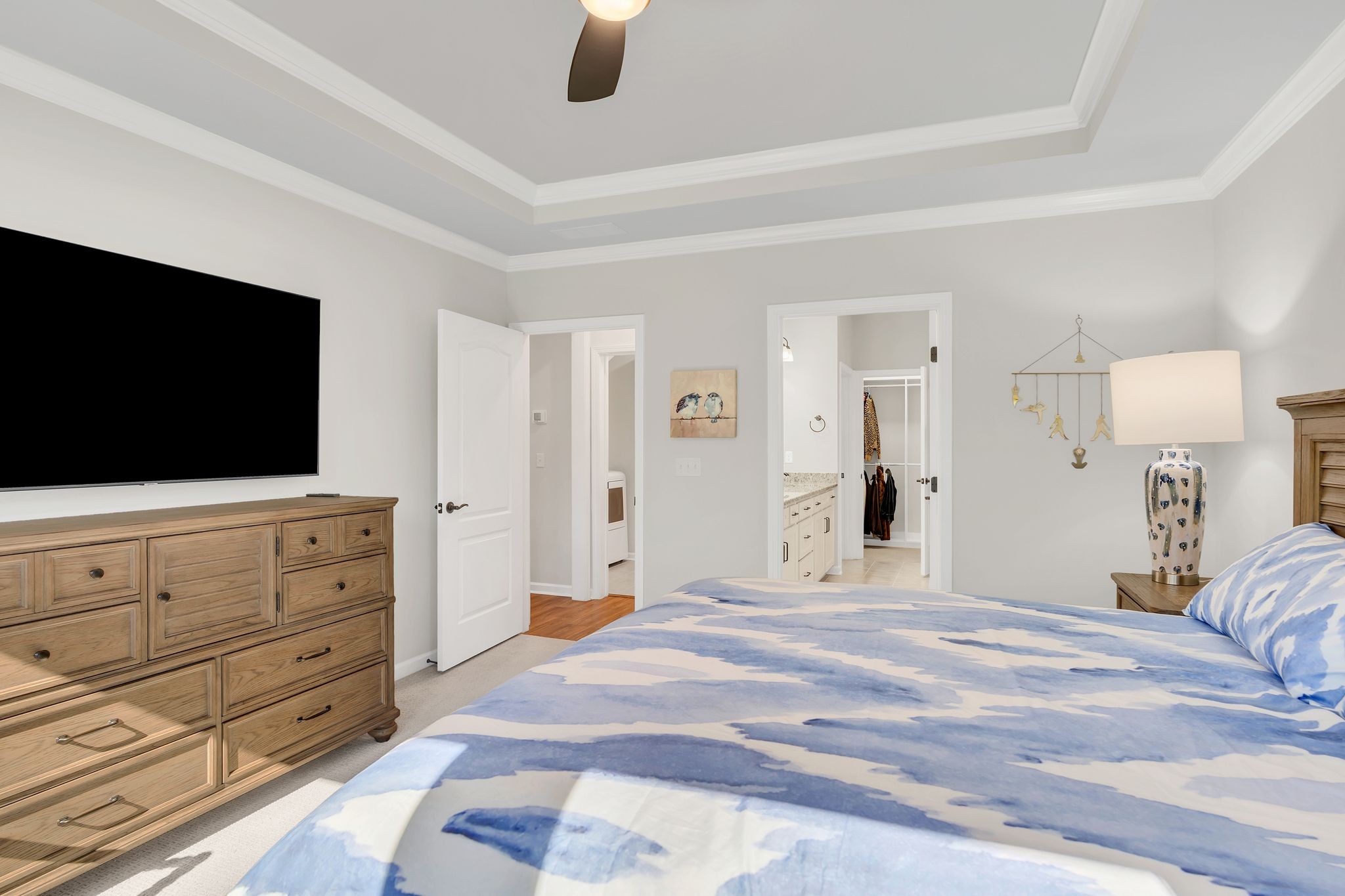 2061 Hardin Place Spring Hill, TN 37174 - Photo 20 of 65 a bedroom with a bed and a flat screen tv