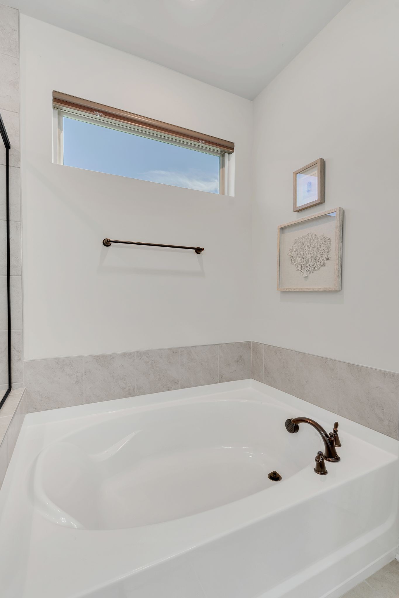 2061 Hardin Place Spring Hill, TN 37174 - Photo 22 of 65 a bathroom with a bathtub