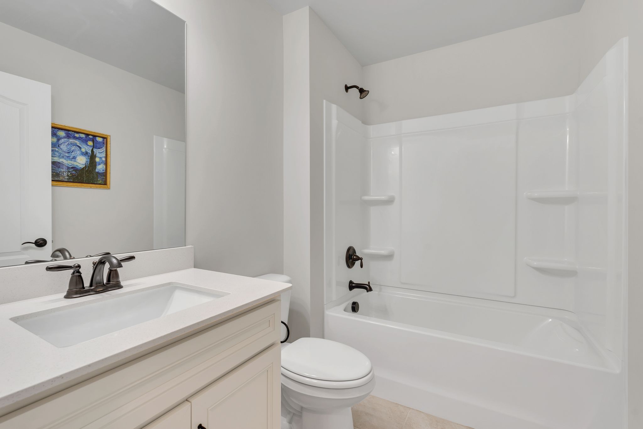 2061 Hardin Place Spring Hill, TN 37174 - Photo 29 of 65 a bathroom with a sink a toilet and a bathtub