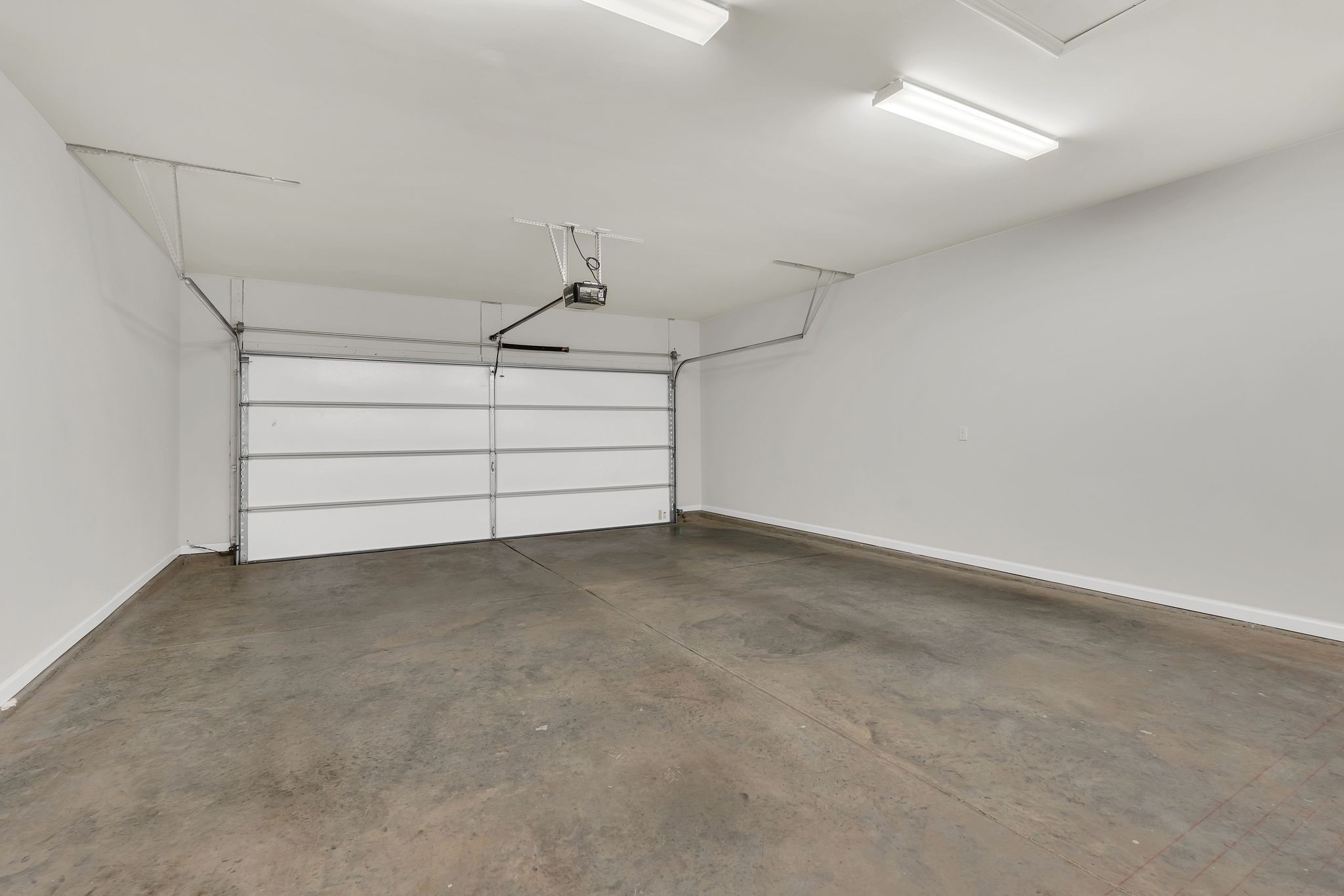 2061 Hardin Place Spring Hill, TN 37174 - Photo 33 of 65 a view of a room with storage and racks on the wall