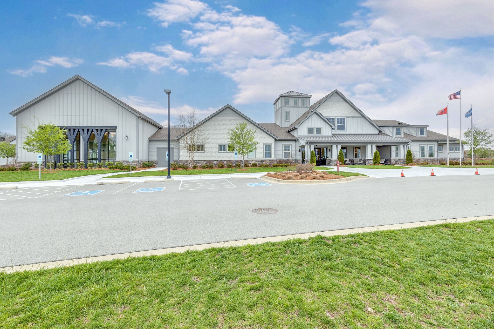 2061 Hardin Place Spring Hill, TN 37174 - Photo 41 of 65 a front view of a house with a yard and lake view