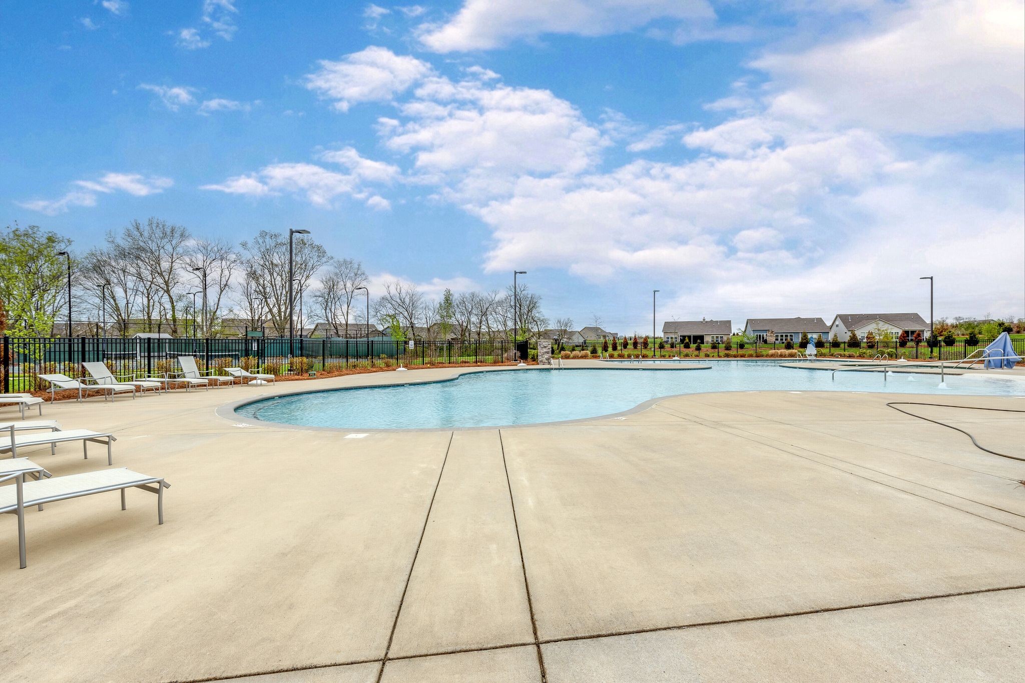 2061 Hardin Place Spring Hill, TN 37174 - Photo 51 of 65 a view of a swimming pool and a yard