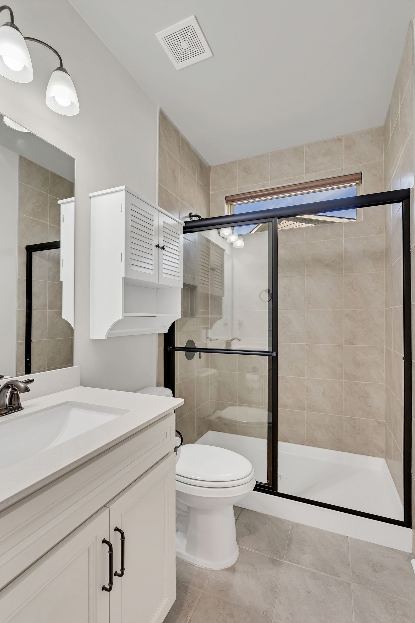 2061 Hardin Place Spring Hill, TN 37174 - Photo 7 of 65 a bathroom with a sink a toilet and shower