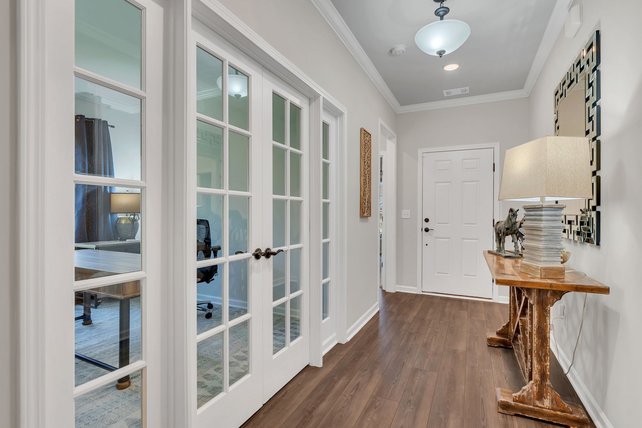 2061 Hardin Place Spring Hill, TN 37174 - Photo 8 of 65 a view of a kitchen with furniture and wooden floor