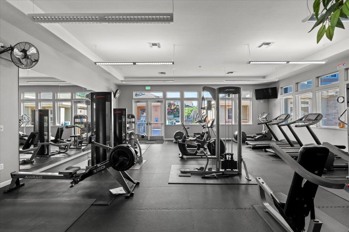 1360 Shady Lane, Unit 1022 Turlock, CA 95382 - Photo 12 of 16 a view of a room with gym equipment