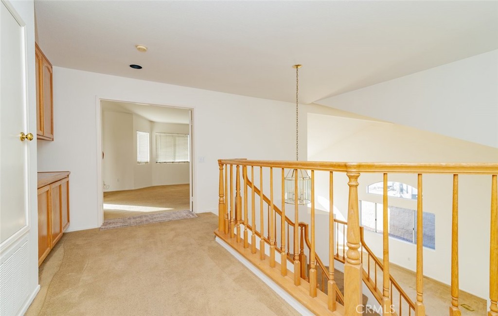 2038 Ridgeline Avenue Vista, CA 92081 - Photo 18 of 32 a view of an entryway with wooden floor