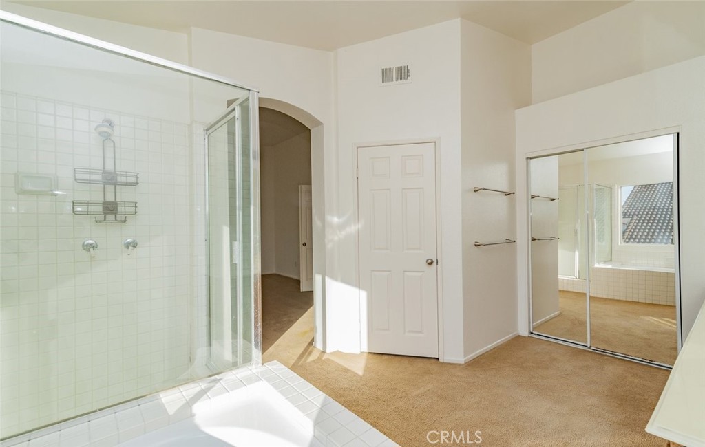 2038 Ridgeline Avenue Vista, CA 92081 - Photo 23 of 32 a view of entryway with white walls and shower