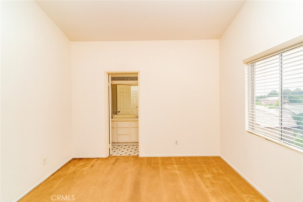 2038 Ridgeline Avenue Vista, CA 92081 - Photo 24 of 32 a view of an empty room with a window