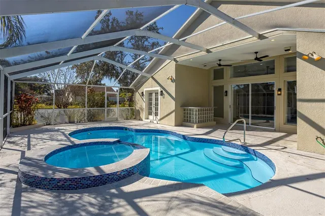 a view of a house with swimming pool